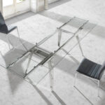 Extendable dining table in tempered glass and chromed steel