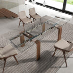 Extendable dining table in tempered glass and Walnut wood