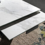 Extendable porcelain and black steel dining table