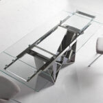 Extendable dining table in tempered glass and chromed steel