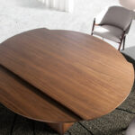 Walnut wood extendable dining table and pyramidal square base