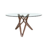 Round glass dining table with wooden legs.