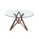 Round glass dining table with wooden legs.