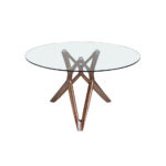 Round glass dining table with wooden legs.