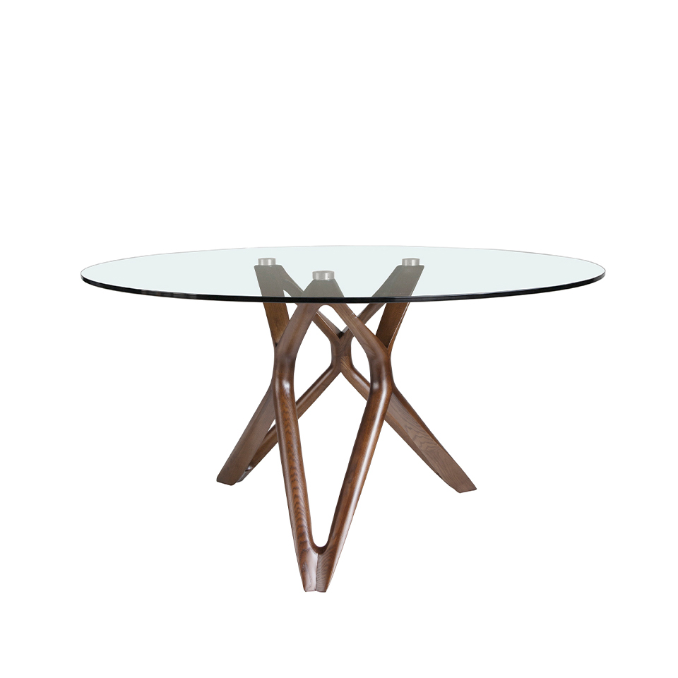 Round glass dining table with wooden legs.