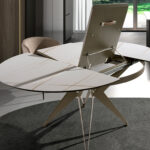 Round porcelain marble and champagne-coloured steel extending dining table