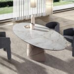 Mesa comedor ovalada mármol porcelánico y acero taupé metalizado