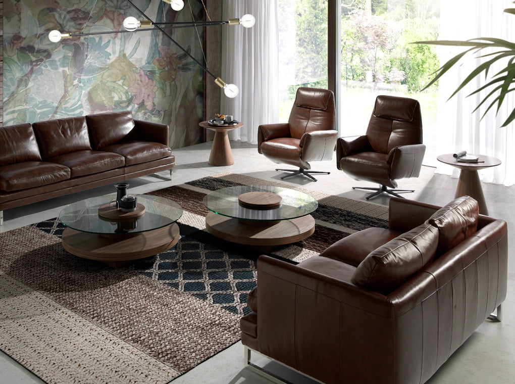 2-seat sofa upholstered in leather with stainless steel legs 2-seat sofa upholstered in leather with stainless steel legs