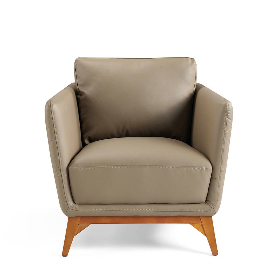 Armchair upholstered in leather and Walnut wood legs Armchair upholstered in leather and Walnut wood legs
