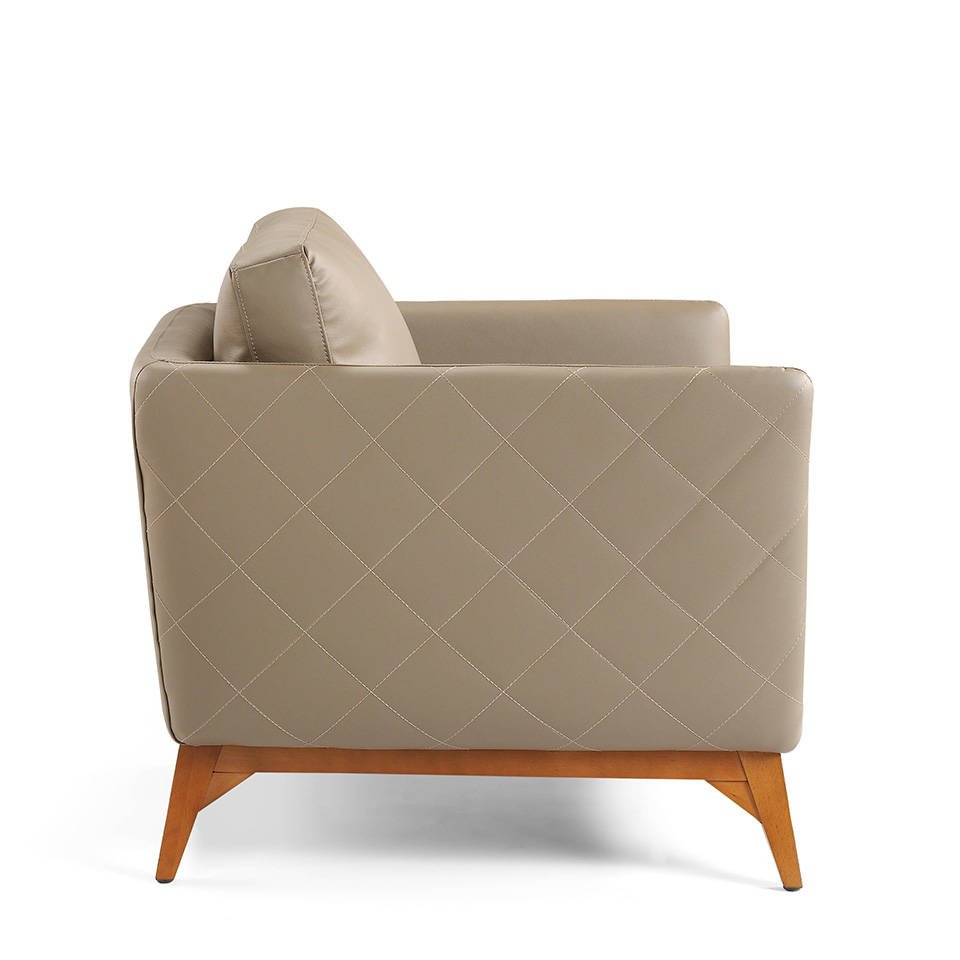 Armchair upholstered in leather and Walnut wood legs Armchair upholstered in leather and Walnut wood legs