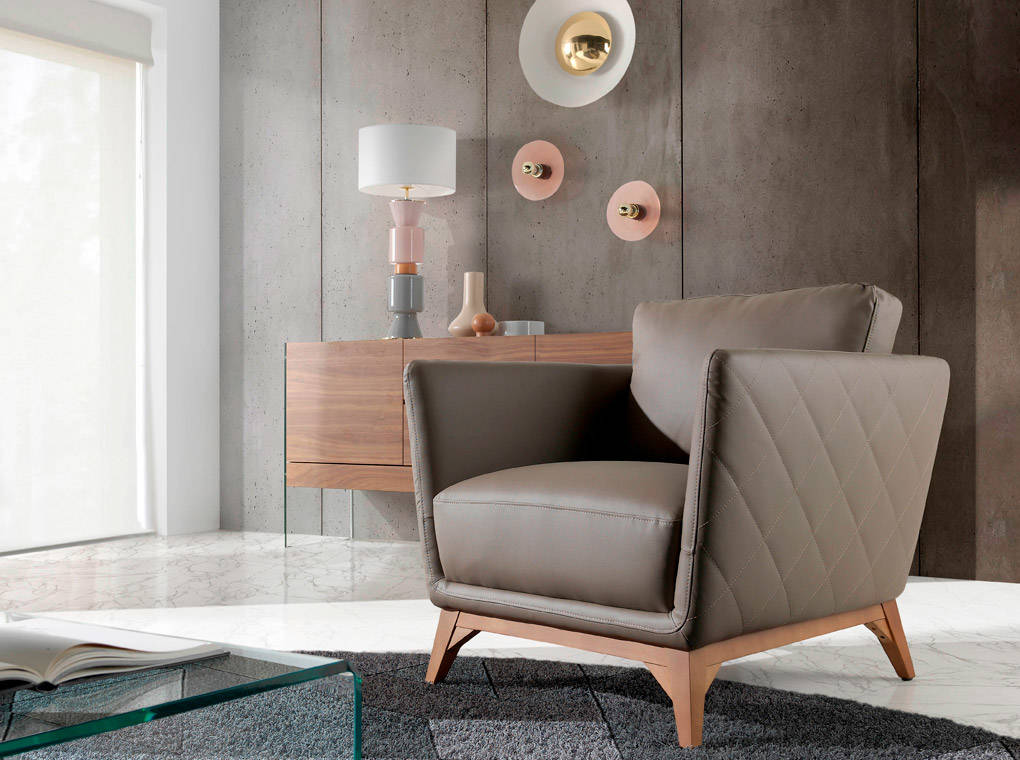 Armchair upholstered in leather and Walnut wood legs Armchair upholstered in leather and Walnut wood legs