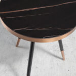 Round corner table in black porcelain marble and steel with a bronze-colored chrome bath.