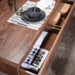 Coffee table in walnut wood and chrome-plated steel