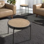 Round coffee table in rattan and black steel