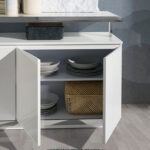 White wooden sideboard and stainless steel