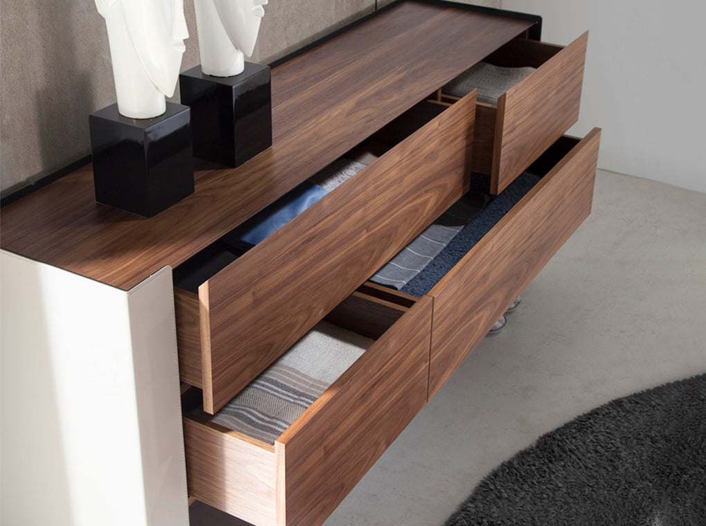 Chest of drawers in walnut wood and chrome-plated steel and recycled leather Chest of drawers in walnut wood and chrome-plated steel and recycled leather