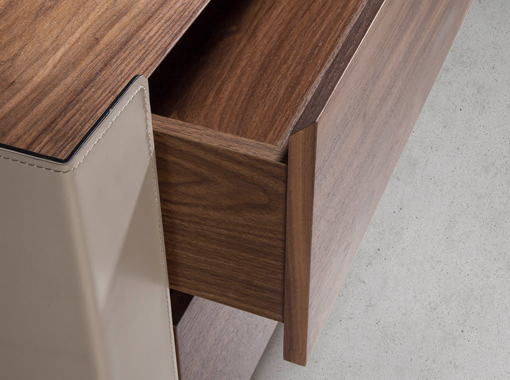 Chest of drawers in walnut wood and chrome-plated steel and recycled leather Chest of drawers in walnut wood and chrome-plated steel and recycled leather