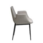 Chair upholstered in fabric with black steel frame