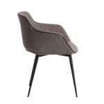 Armchair upholstered in fabric with black steel frame