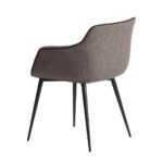 Fauteuil rembourré en tissu avec structure en acier noir