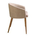 Chair upholstered in fabric with Walnut colored wooden legs