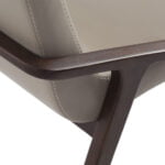 Chair upholstered in leatherette and solid walnut wood frame