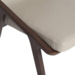 Chair upholstered in leatherette and solid walnut wood frame