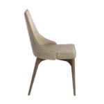 Chair upholstered in fabric with Walnut colored wooden legs