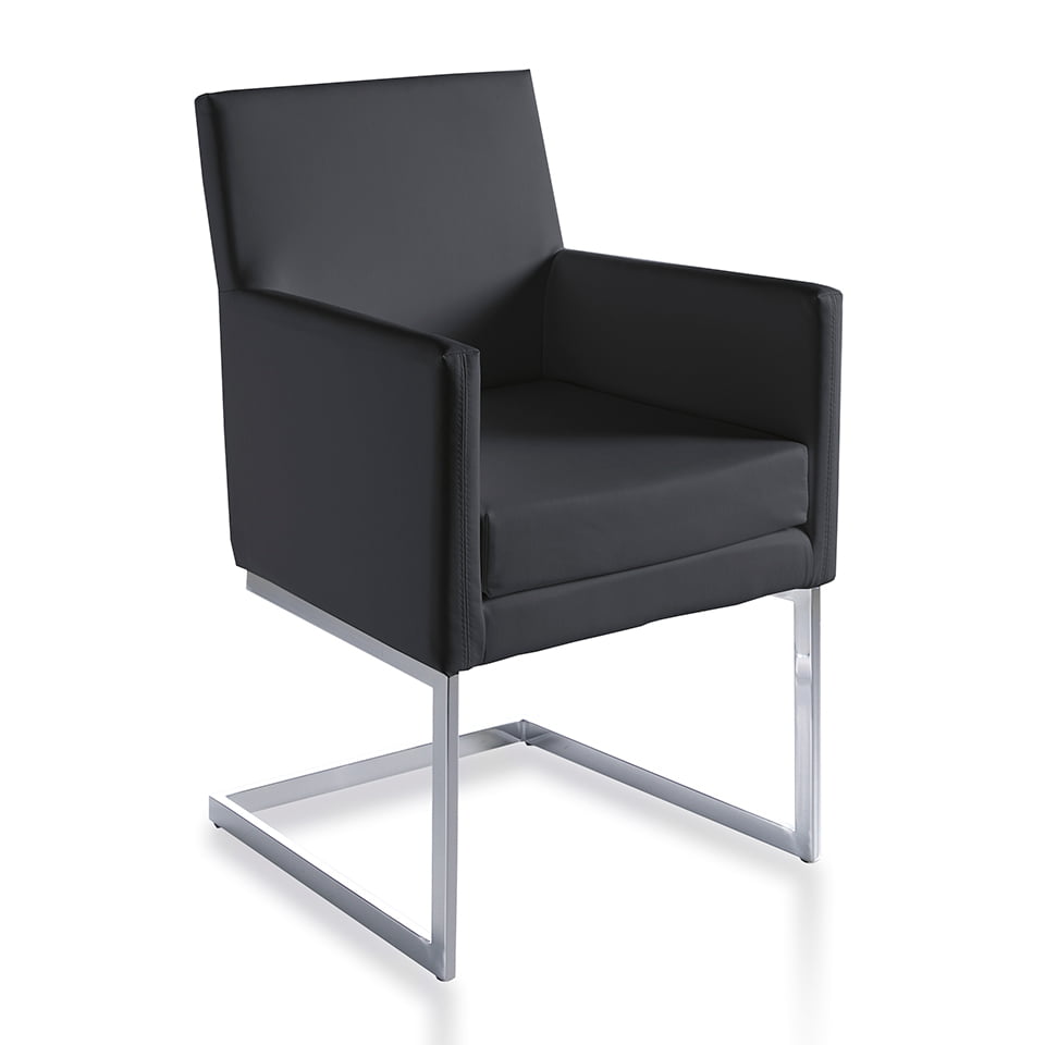 Armchair upholstered in leatherette with chromed steel frame