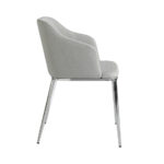 Chair upholstered in fabric with chromed steel frame