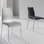 Chair upholstered in leatherette with chromed steel frame