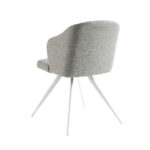 Chair upholstered in fabric with white steel legs