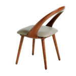 Upholstered chair in walnut veneered wood
