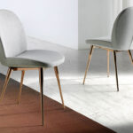 Chair upholstered in fabric with rose gold steel legs