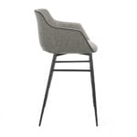 Stool upholstered in fabric with edging and structure in black steel