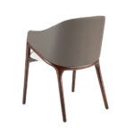 Chair upholstered in fabric and leatherette with Walnut colored wooden frame