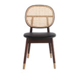 Chair upholstered in leatherette with rattan backrest and walnut wood legs