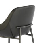 Stool upholstered in fabric and leatherette with black steel legs