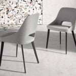 Fabric upholstered chair with black steel legs