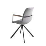 Swivel chair upholstered in fabric with black steel legs