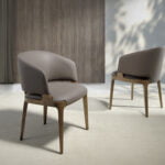 Chair upholstered in eco-leather and structure in solid ash.