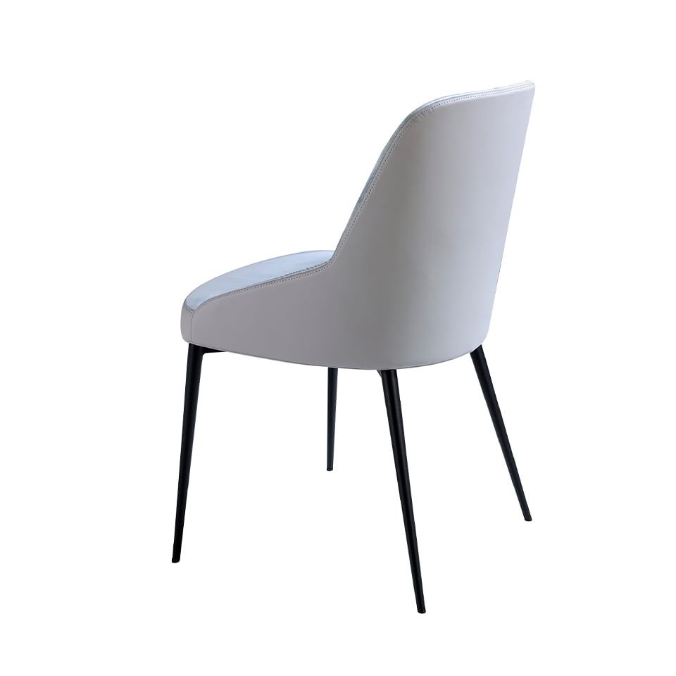 Dining chair upholstered in velvet and eco-leather. Black steel structure.