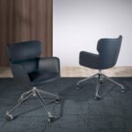 Blue swivel office chair with armrests and steel legs