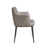 Dining chair upholstered in fabric and black steel structure.