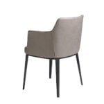 Dining chair upholstered in fabric and black steel structure.