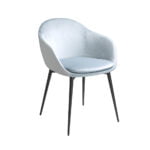 Silla comedor tapizada en terciopelo y polipiel. Estructura en acero negro.