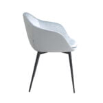 Silla comedor tapizada en terciopelo y polipiel. Estructura en acero negro.