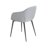 Silla comedor tapizada en terciopelo y polipiel. Estructura en acero negro.