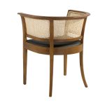 Dining chair upholstered in eco-leather with rattan mesh back. Structure in ash wood painted in walnut colour.