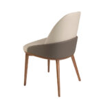 Dining chair upholstered in eco-leather with ash wood legs